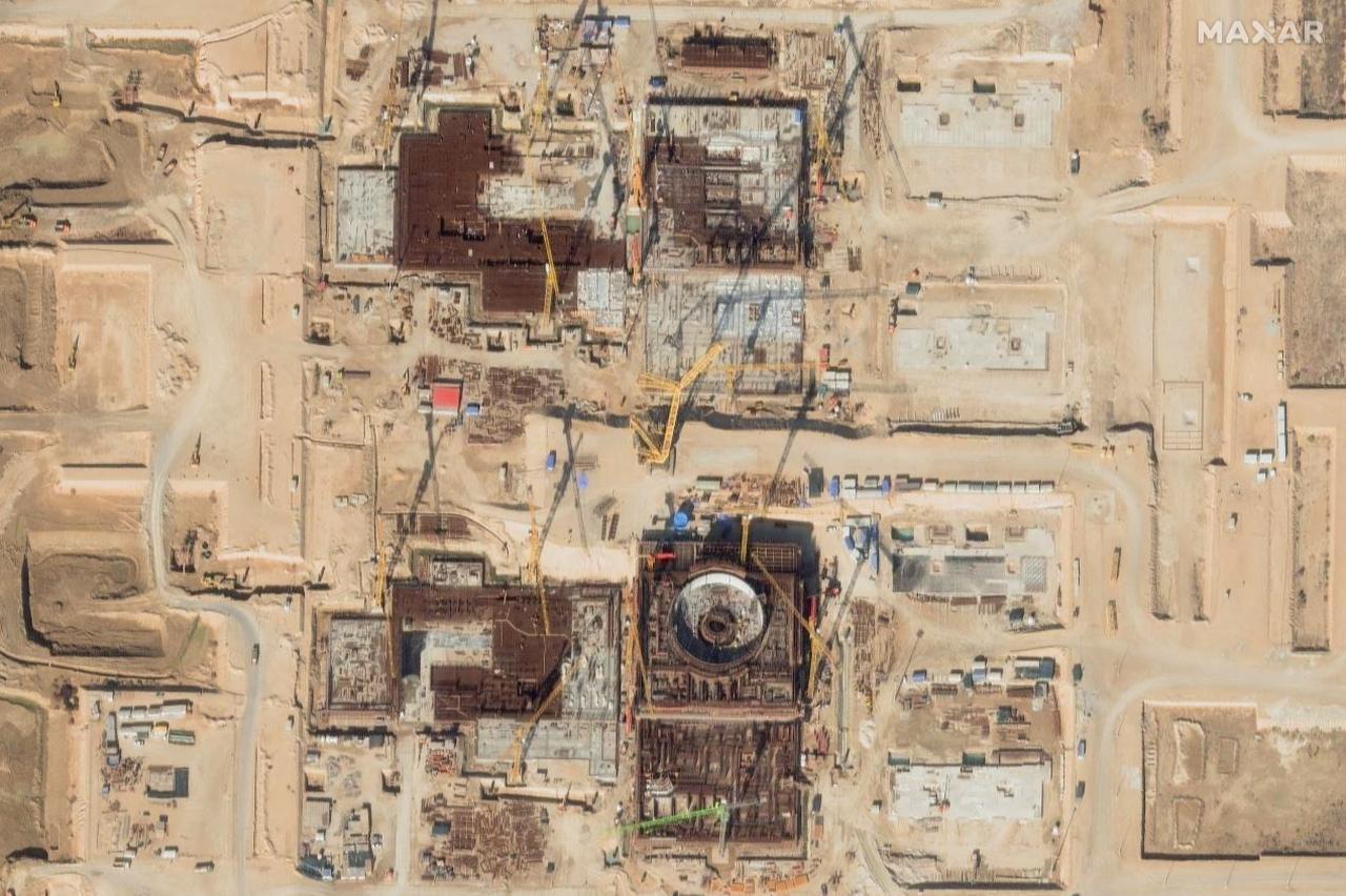 This handout satellite image taken on February 14, 2025 shows the Bushehr new reactors under construction. (Photo by Satellite image ©2021 Maxar Technologies/AFP)