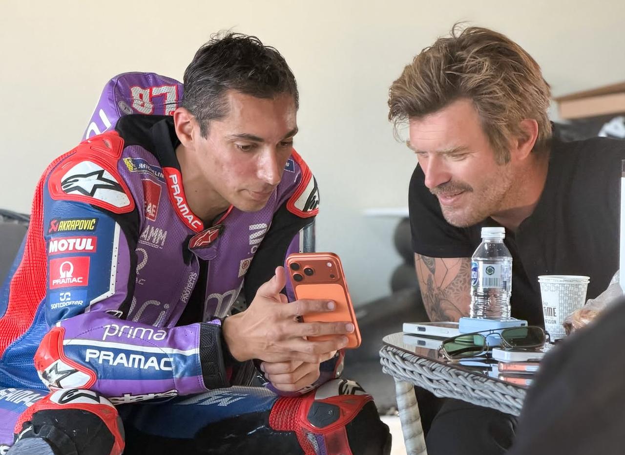 Toprak Razgatlioglu and Kivanc Tatlitug look at a phone during their meeting at the Motor Sports Development Center in Kocaeli, Türkiye. (Photo via Instagram/@toprakrazgatlioglu7)