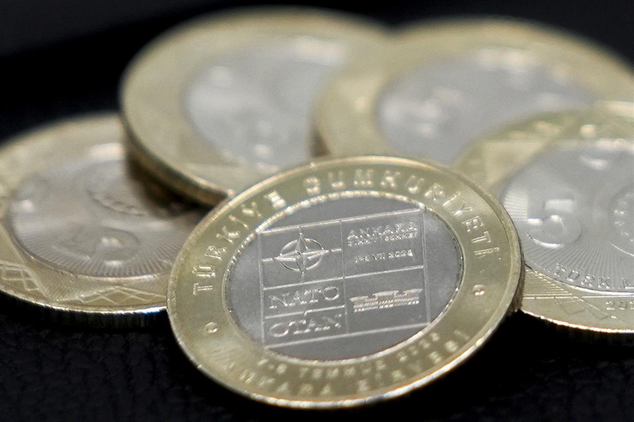 Türkiye's General Directorate of Mint and Stamp Printing has issued specially designed 5-lira commemorative coin, which is legal tender, to mark the 36th NATO Summit held in Ankara, Türkiye, July 6, 2026. (AA Photo)