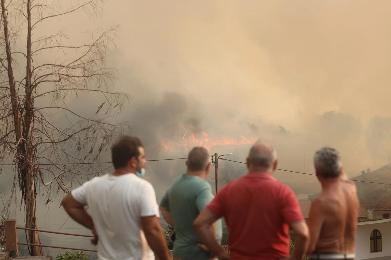 Aerial and ground crews battle the wildfire that broke out in Vila-Real, Portugal on July 30, 2026. (AA Photo)