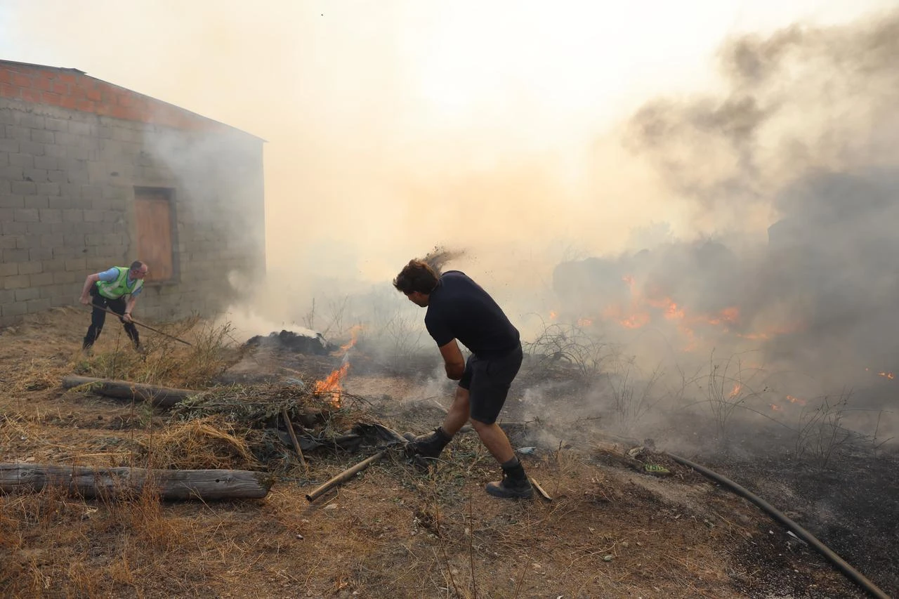 Aerial and ground crews battle the wildfire that broke out in Vila-Real, Portugal on July 30, 2026. (AA Photo)