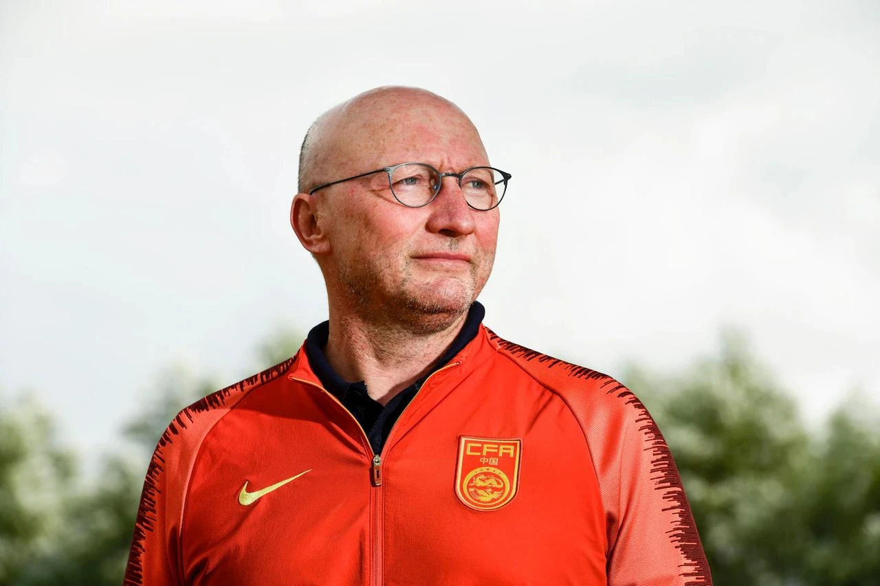 Chris Van Puyvelde, then technical director of the Chinese Football Association, poses during a training session in China. (Photo via hln.be)