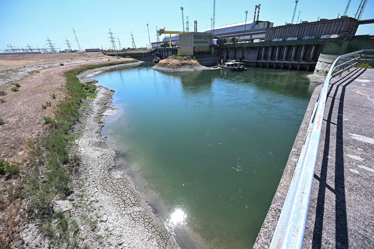 The Paks Nuclear Power Plant’s water intake structure and cold-water canal working with water from the river Danube is pictured near Paks on July 31, 2026. (AFP Photo)
