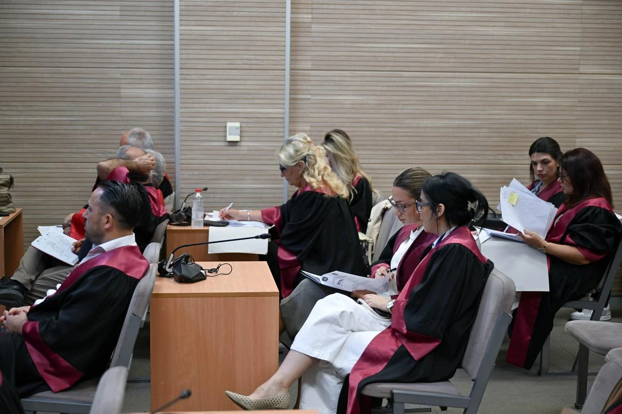 Lawyers attend a preliminary hearing in the trial of 21 Serbs, including former top Serbian police officials, over their alleged role in the Recak (Racak in Serbian) massacre, one of the worst crimes against ethnic Albanian civilians during the 1990s war, at the courthouse in Pristina on July 31, 2026. (AFP Photo)