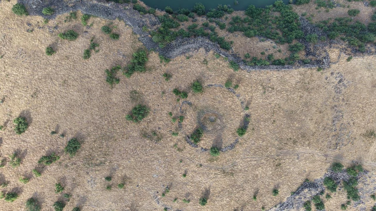 An aerial view shows a circular stone feature inside the newly identified fortress in Mus, eastern Türkiye. (IHA Photo)