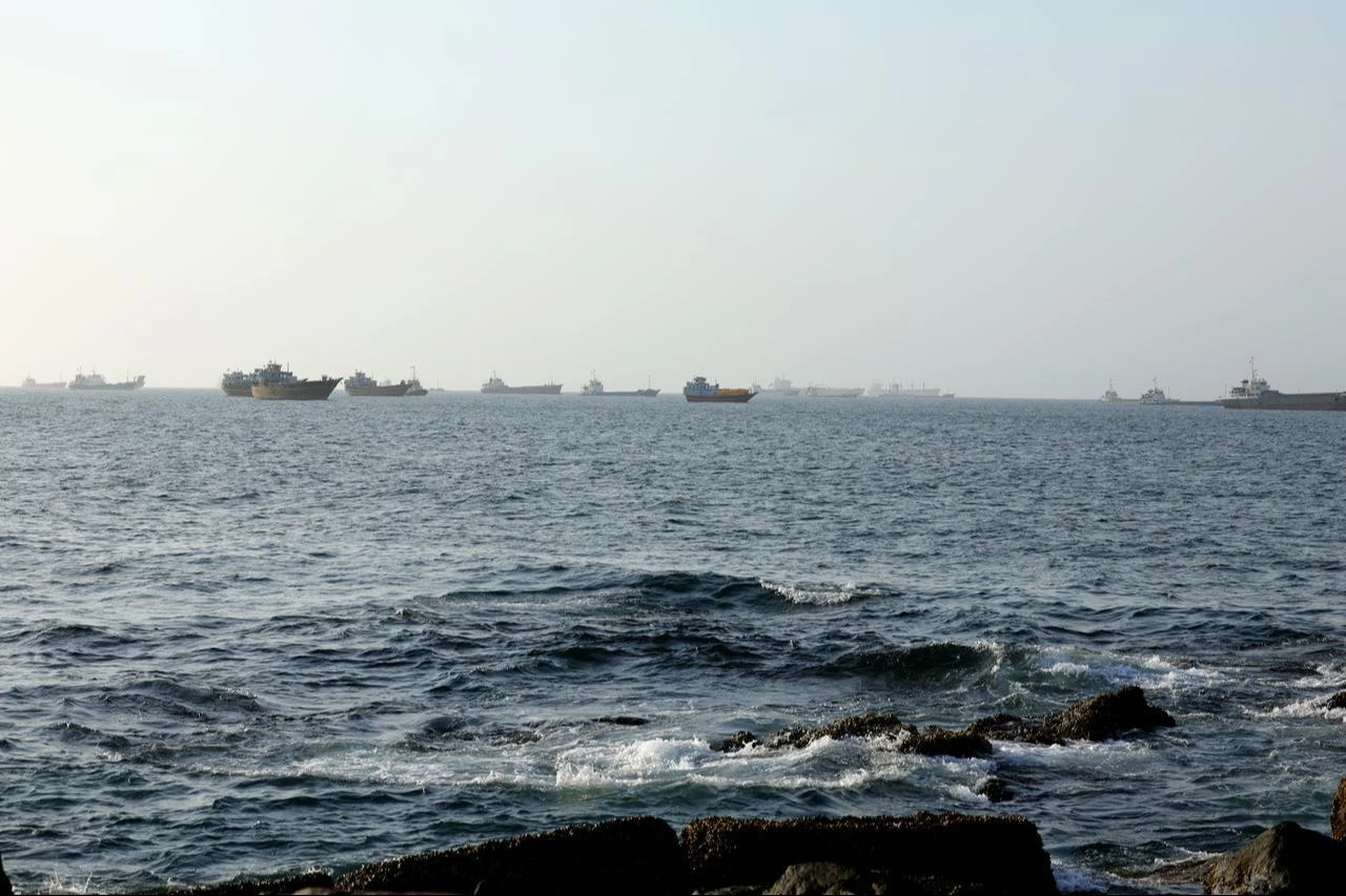 Commercial vessels and oil tankers preparing to transit through the Strait of Hormuz, in the Gulf of Oman, June 17, 2026. (AA Photo)