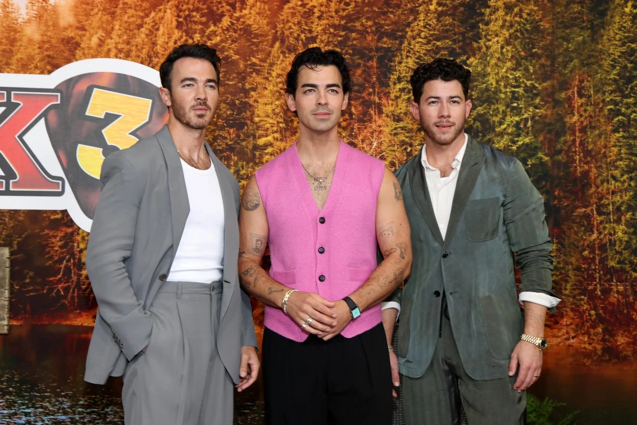 (L-R) Kevin Jonas, Joe Jonas and Nick Jonas attend Disney's "Camp Rock 3" premiere at The Walt Disney Studio Lot in California, Aug. 10, 2026. (AFP Photo)