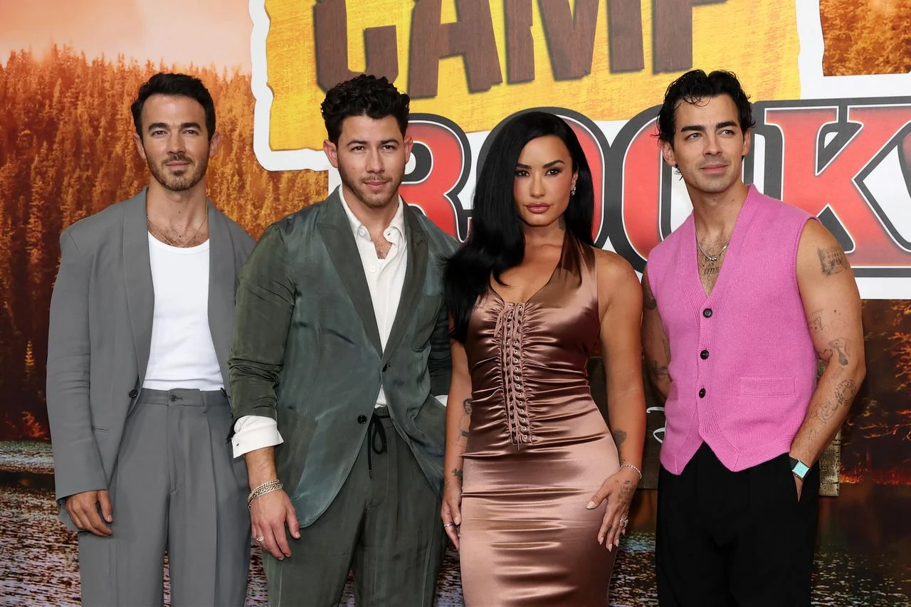 Demi Lovato (C-R), Kevin Jonas (L), Joe Jonas (R) and Nick Jonas attend Disney's "Camp Rock 3" premiere at The Walt Disney Studio Lot in California, Aug. 10, 2026. (AFP Photo)