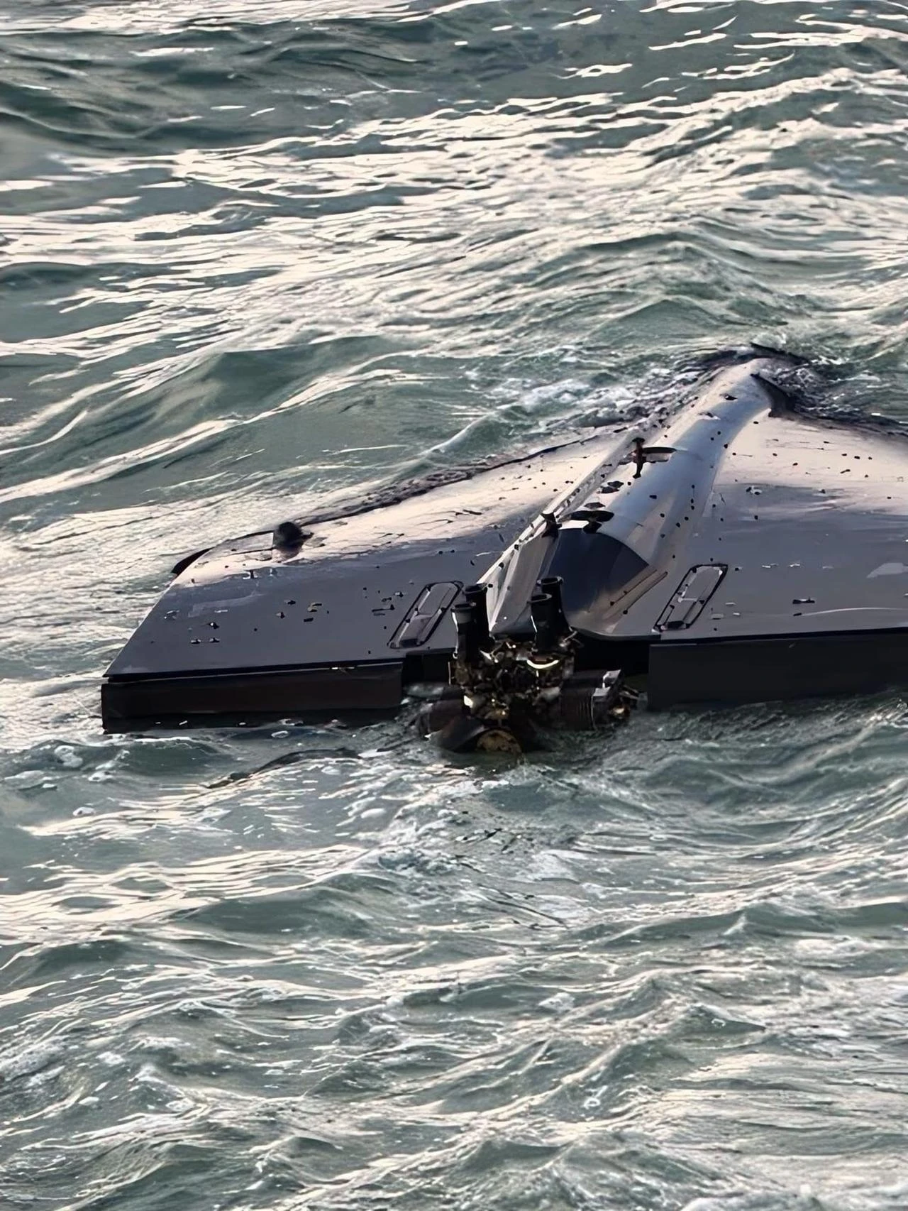 The photo shows the unmanned aerial vehicle (UAV) that washed ashore off the coast of Akcakoca, in Türkiye's northern Duzce province, on Aug. 10, 2026. (IHA Photo)