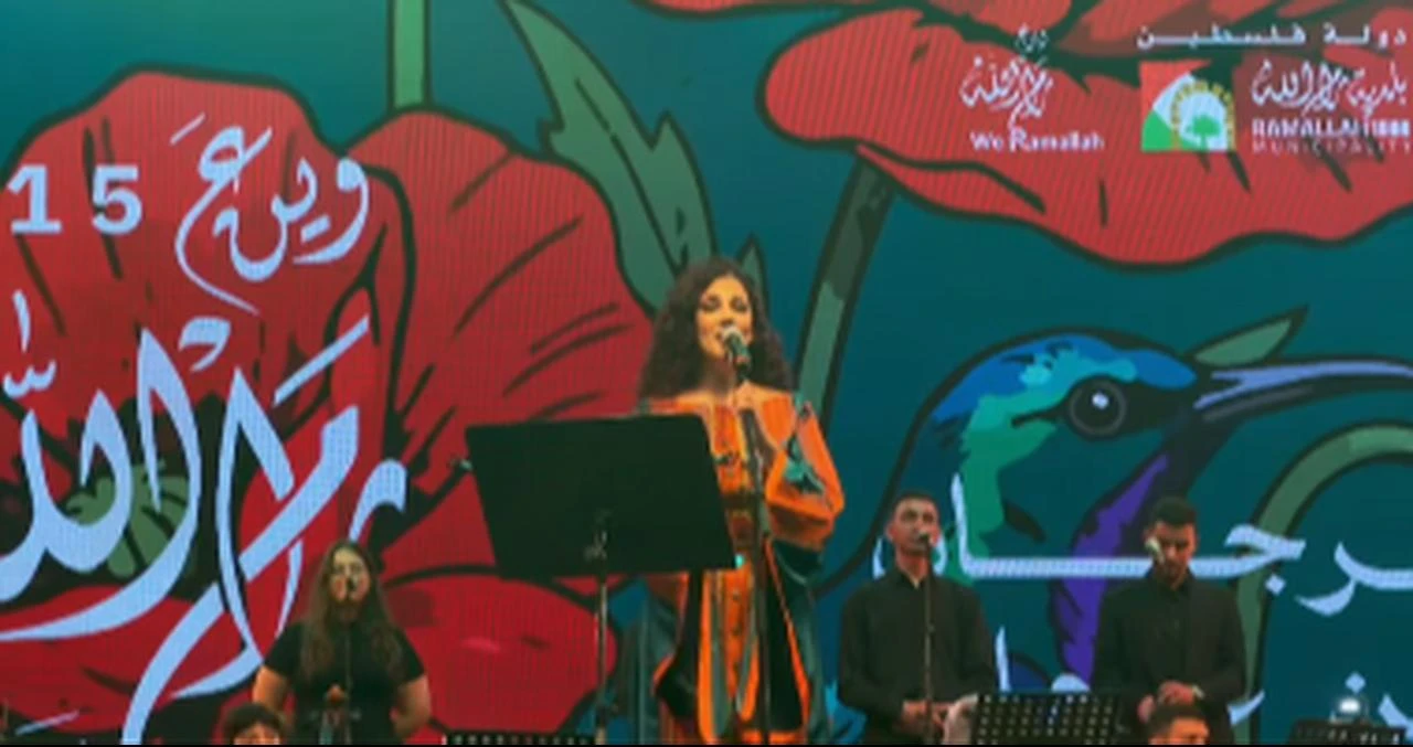 A Palestinian singer performs on stage during the opening events of the 15th Wein a Ramallah festival in Ramallah. (Photo via Instagram/@ramallahmunicipality)
