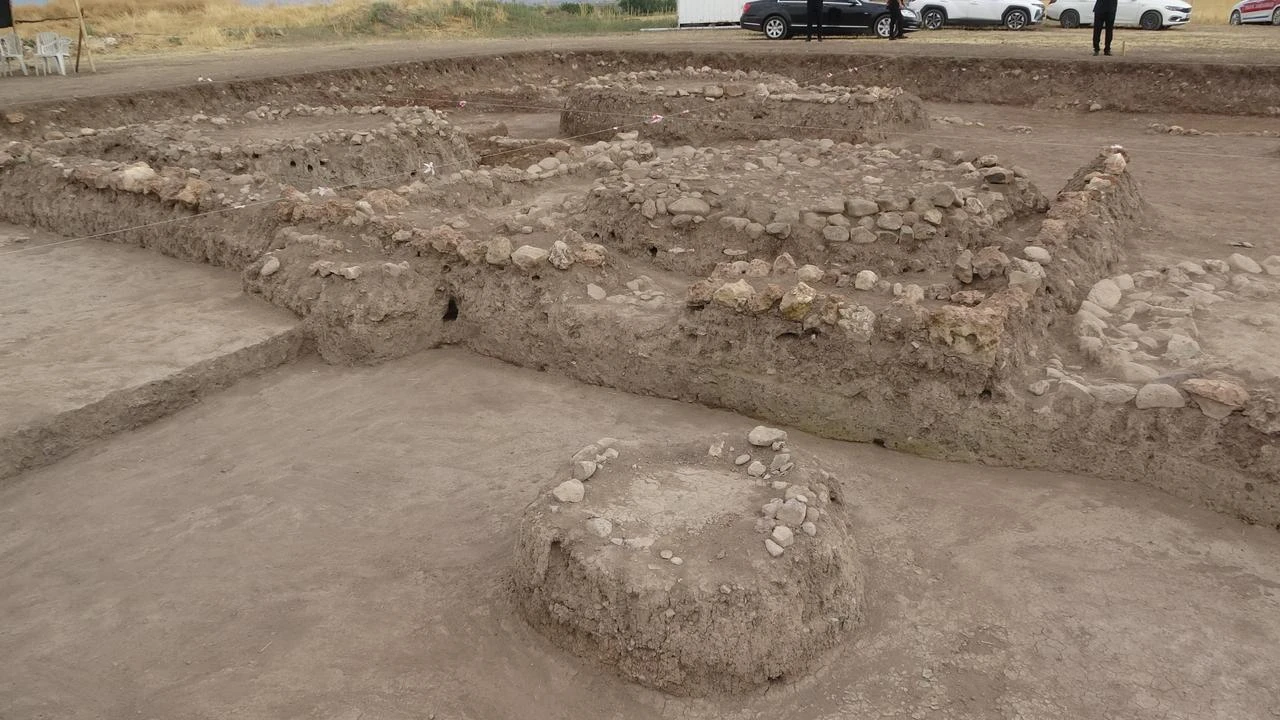 Stone and mudbrick architectural remains uncovered during excavations at Domuztepe in Kahramanmaras, southern Türkiye. (IHA Photo)