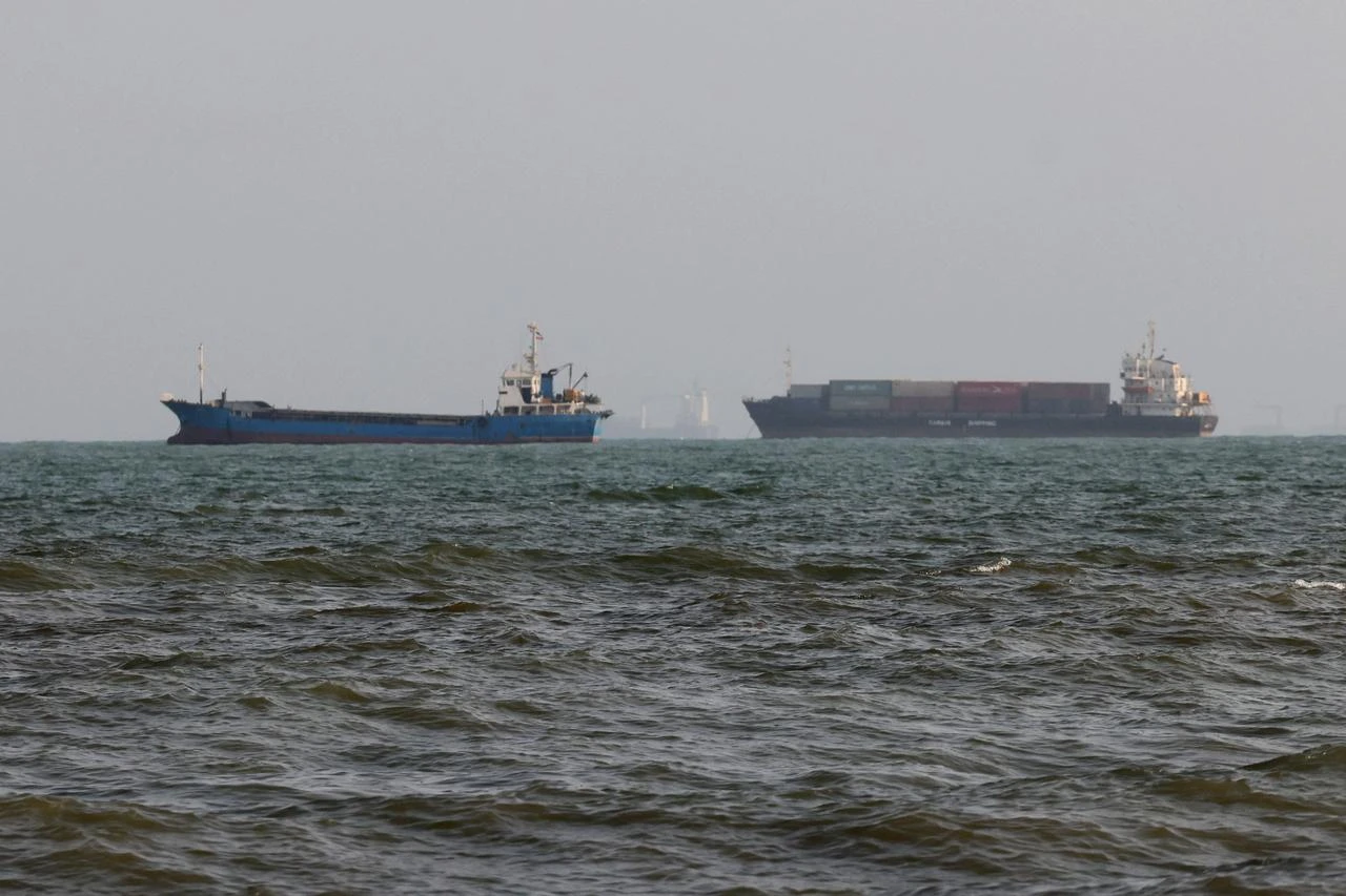 Vessels are seen in the Strait of Hormuz, off the port city of Bandar Abbas in southern Iran on August 10, 2026. (AFP Photo)