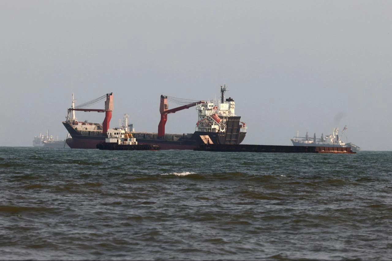 Vessels are seen in the Strait of Hormuz, off the port city of Bandar Abbas in southern Iran on August 10, 2026. (AFP Photo)