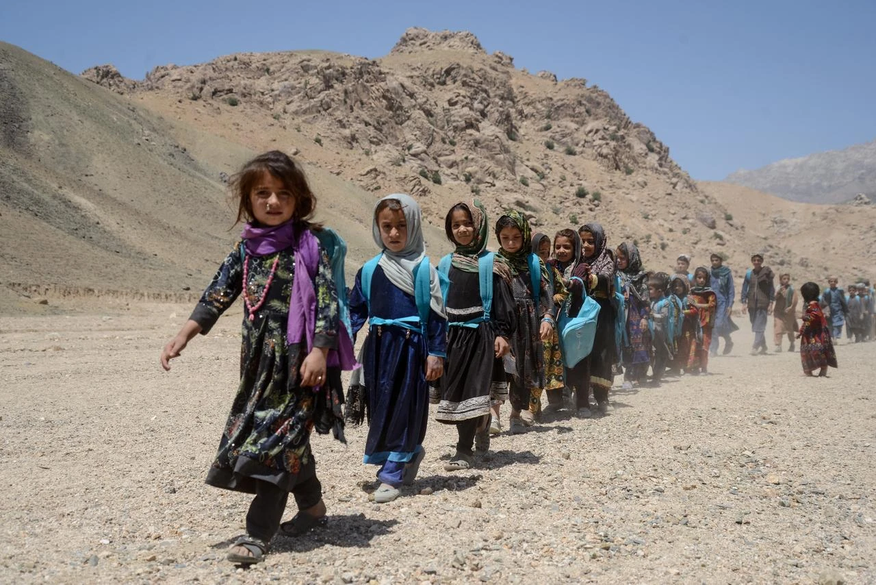 Afghan children leave after attending a primary school in Khvajeh Atis village in southern Afghanistan's Zabul province on May 11, 2026. (AFP Photo)