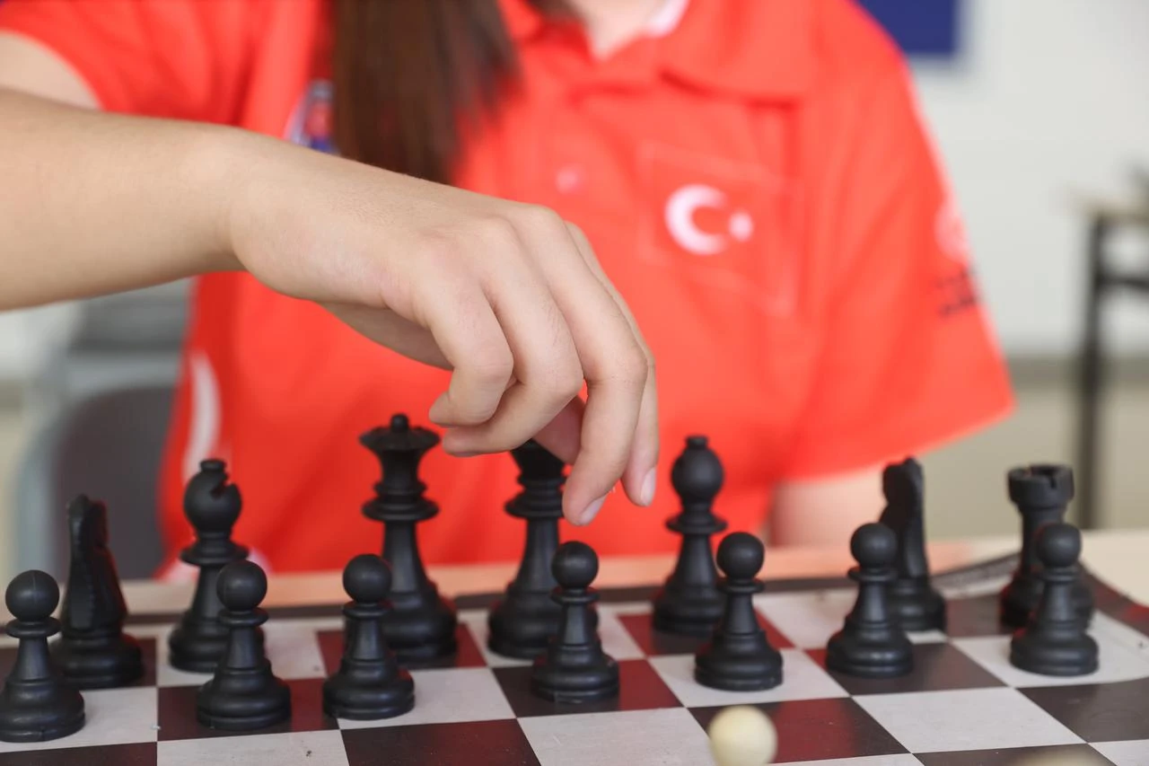 Türkiye's national chess player Beren Kalyoncu moves a piece during a training session in Gaziantep, Türkiye, Aug. 12, 2026. (AA Photo)
