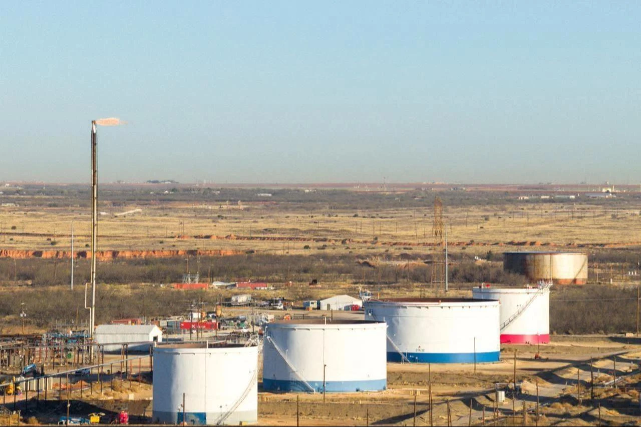 In an aerial view, oil storage tanks are seen at the Big Spring Refinery on March 19, 2026, in Big Spring, Texas. (AFP Photo)