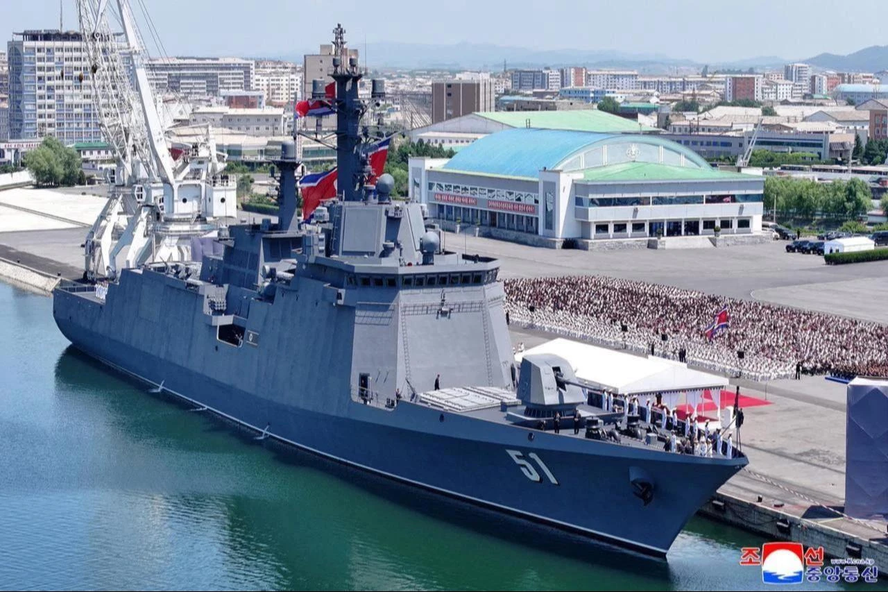 This picture taken on June 23, 2026 and released by North Korea's official Korean Central News Agency (KCNA) on June 24, 2026 shows a commissioning ceremony of the new-type multi-mission destroyer Choe Hyon at Nampo port in North Korea. (Photo via Korean Central News Agency (KCNA)/HO/AFP)