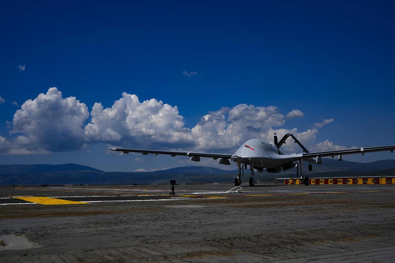 Bayraktar TB3 Unmanned Aerial Vehicle (UAV) is transported to the flight deck via elevator after inspection during the EFES-2026 exercise in Urla district of Izmir, Türkiye, May 15, 2026. (AA Photo)