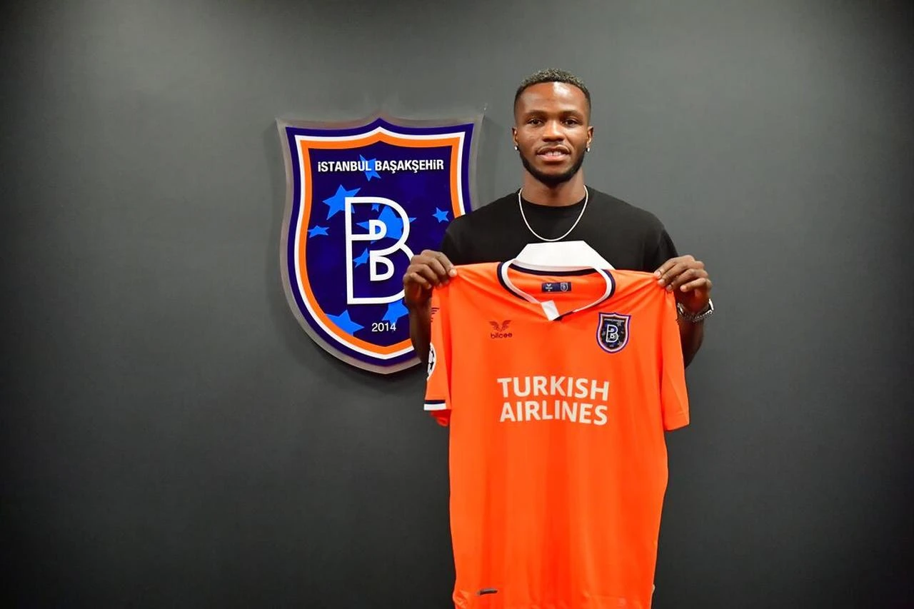 Boli Bolingoli-Mbombo poses with an Istanbul Basaksehir jersey after joining the Turkish club. (Photo via Istanbul Basaksehir)