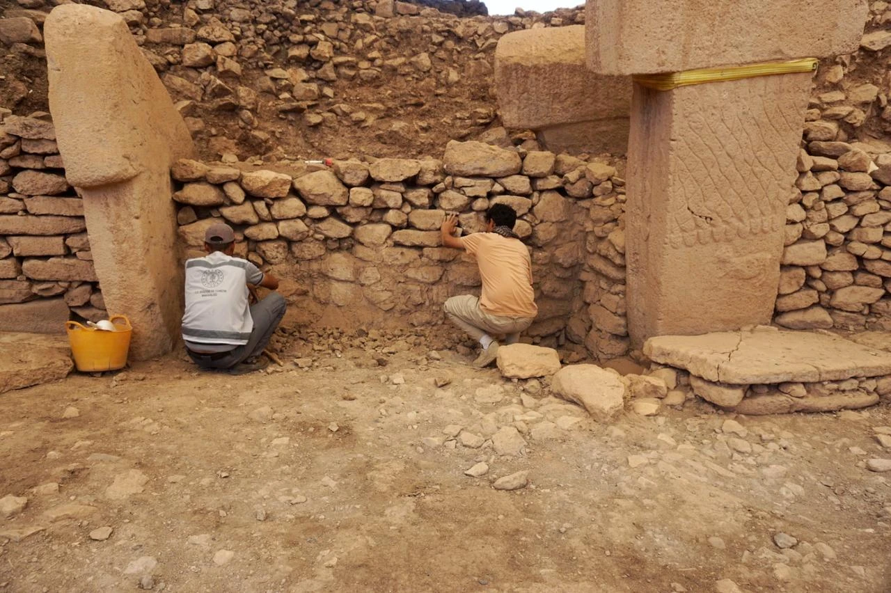 Archaeologists work among monumental T-shaped stone pillars during ongoing excavations at Gobeklitepe in Sanliurfa, Türkiye. (IHA Photo)