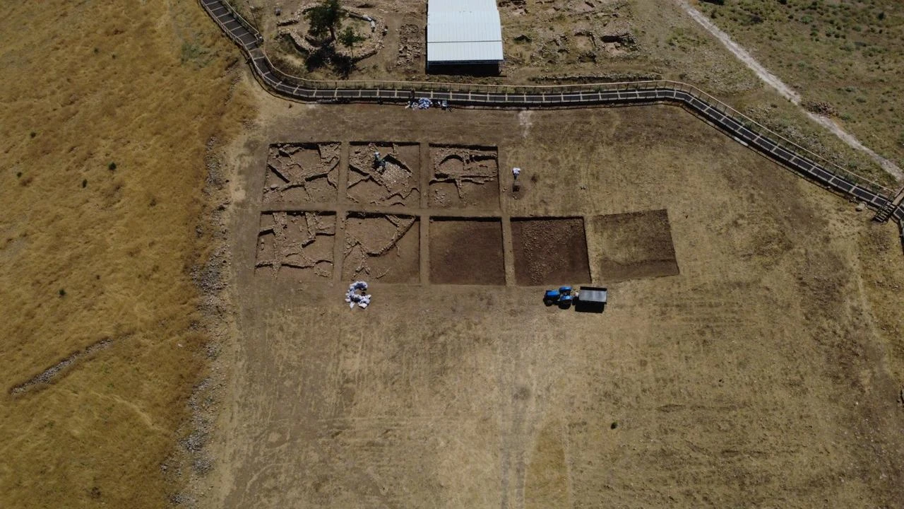 An aerial view shows newly opened excavation trenches and architectural remains uncovered during archaeological work at Gobeklitepe in Sanliurfa, Türkiye. (IHA Photo)