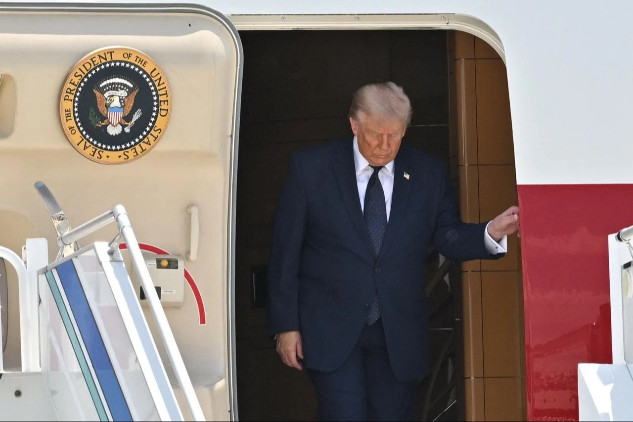 US President Donald Trump disembarks from Air Force One upon his arrival at Etimesgut Air Base near Ankara, Türkiye, on July 7, 2026, to attend the 36th NATO Summit. (AFP Photo)