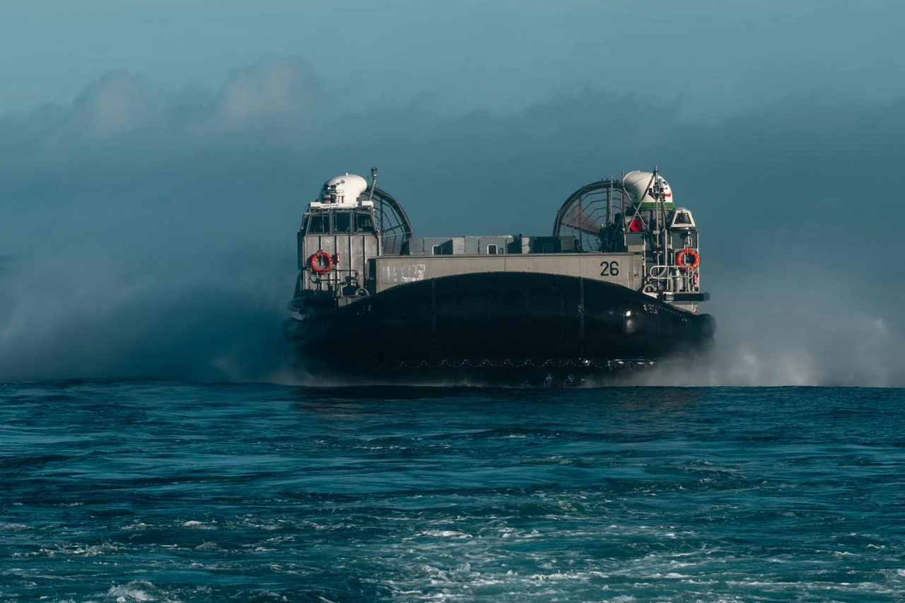 A landing craft air cushion approaches the well deck of the San Antonio-class amphibious transport dock USS Arlington (LPD 24) during UNITAS 2025 multinational maritime exercise. (Photo via U.S. Navy)