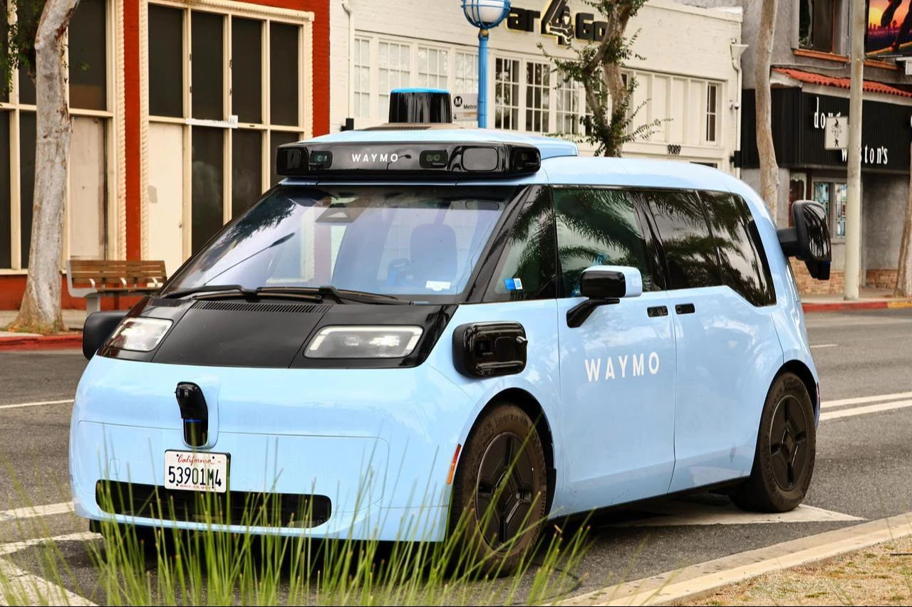 A Waymo self-driving vehicle travels on a street in Los Angeles, California, U.S. (Adobe Stock Photo)