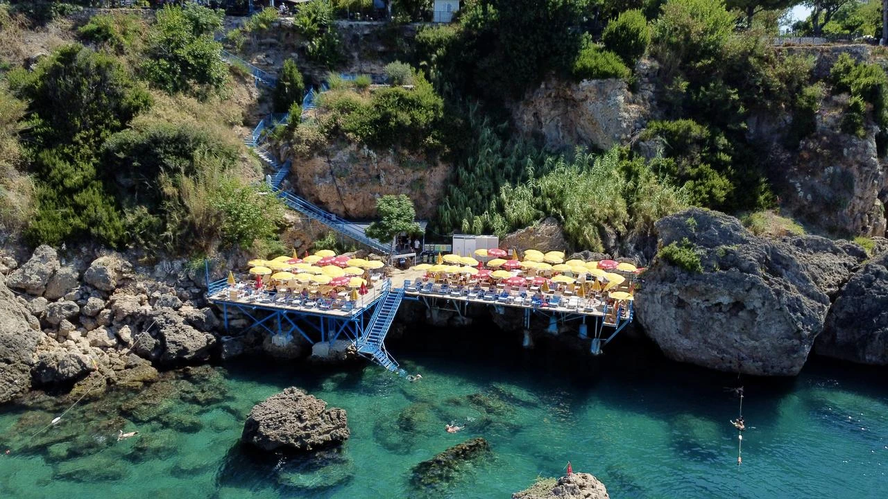 Antalya's cliffside beaches fill with summer visitors