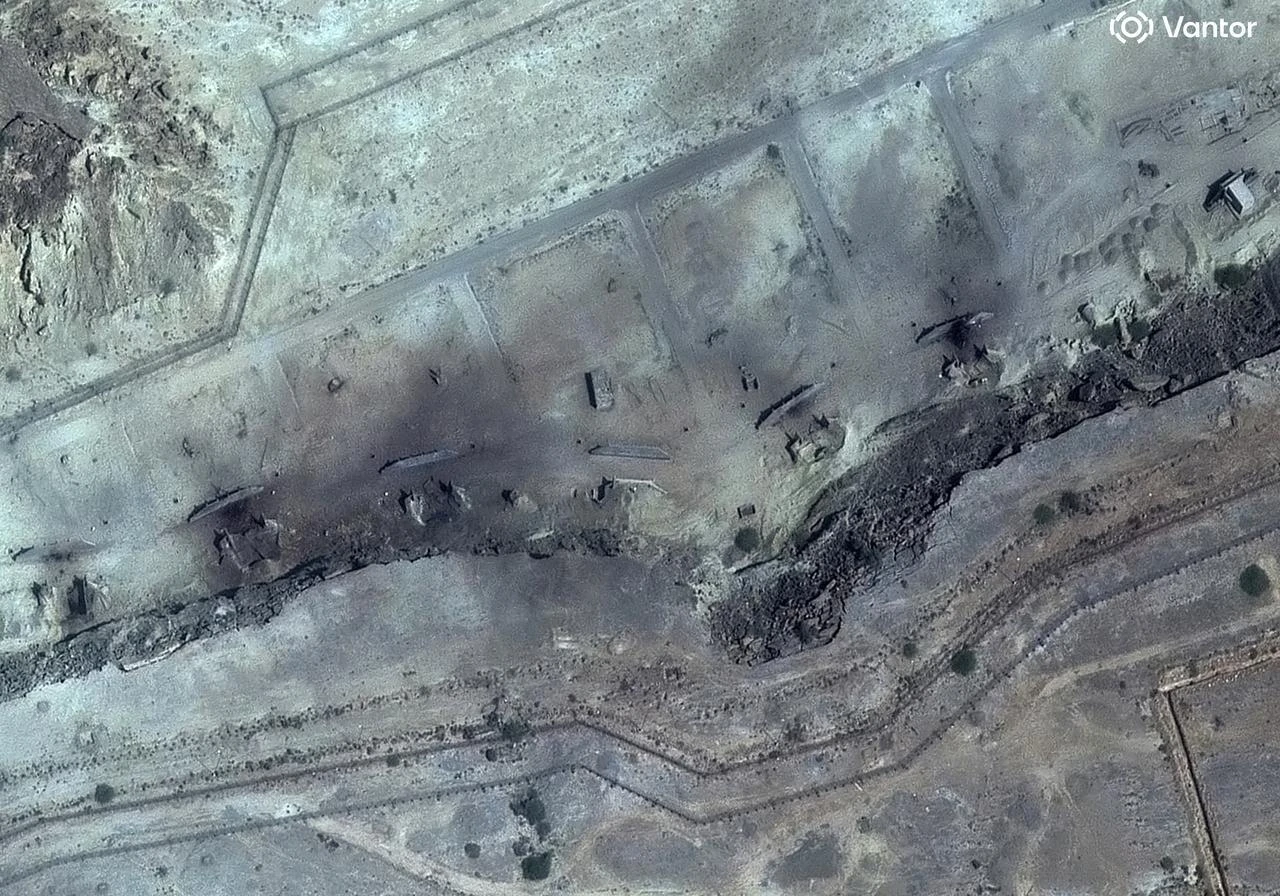 This handout satellite image courtesy of Vantor taken and released on March 1, 2026 shows a closer view of destroyed storage bunkers at Konarak Naval Base in southern Iran along the Gulf of Oman. (AFP Photo/Satellite image ©2026 Vantor/Handout)