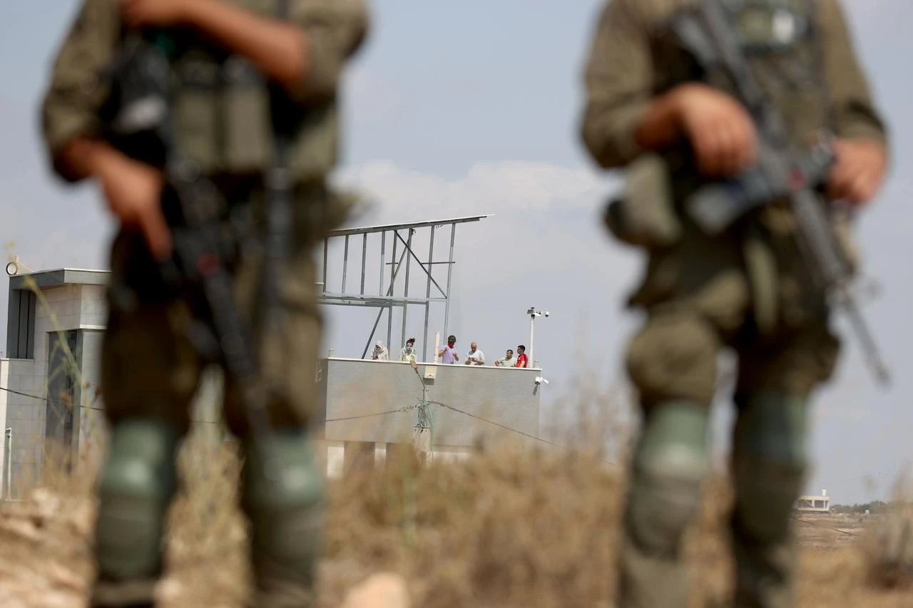 Palestinian, Israeli and foreign activists attempt to deliver basic supplies to three Palestinian families living in the Ras al-Ayn area of Qusra, south of Nablus in the West Bank, Palestine, on August 14, 2026. (AA Photo)