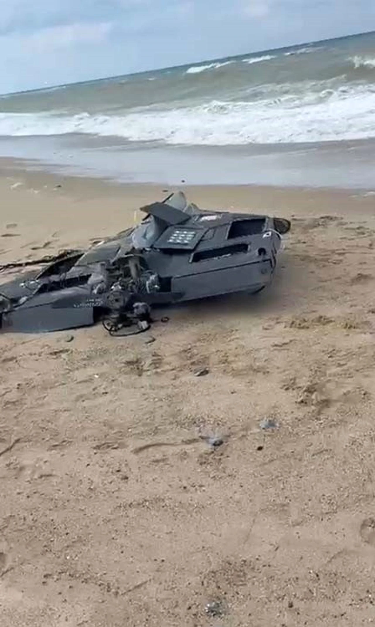 The photo shows the Russian Geran-2 unmanned aerial vehicle (UAV) that washed ashore on Yenikoy beach in Istanbul's Arnavutkoy district on Aug. 15, 2026. (IHA Photo)