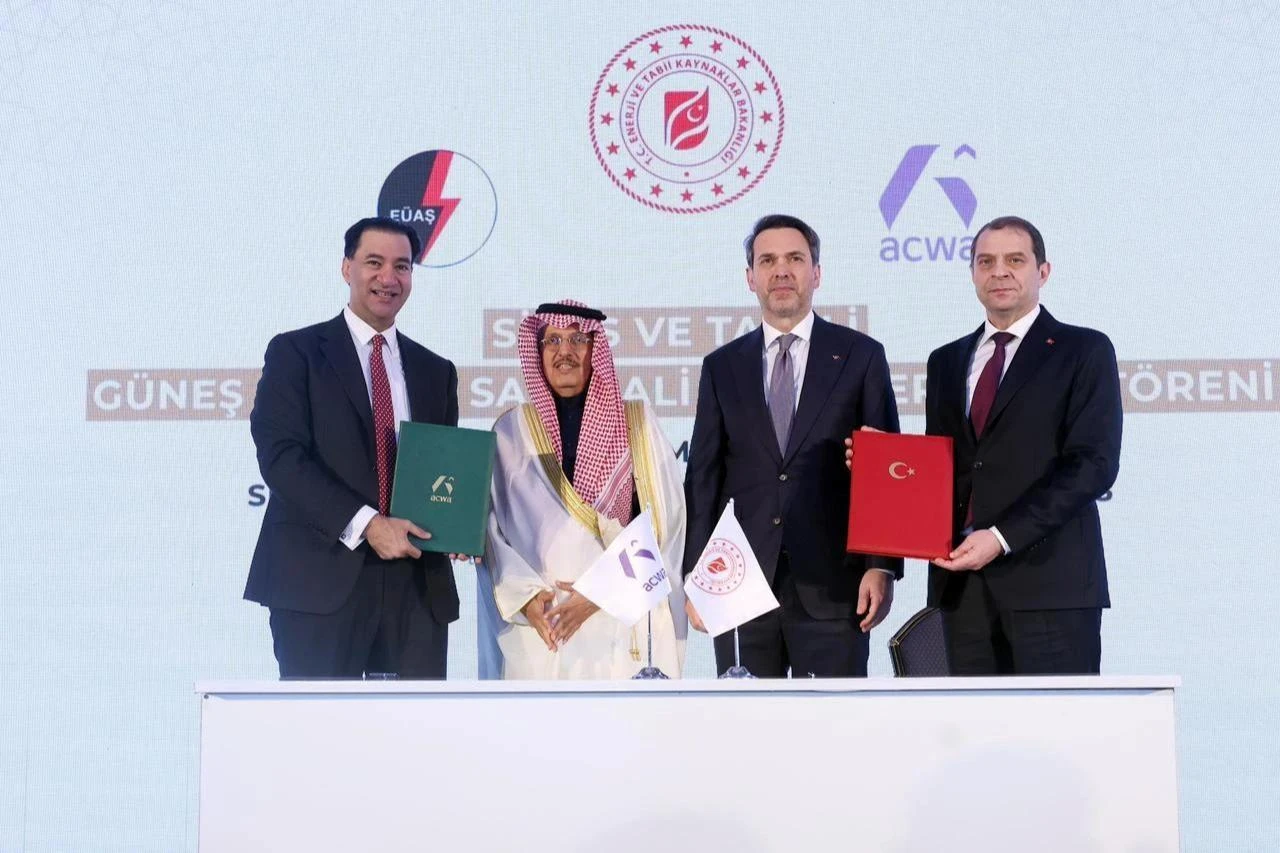 Energy and Natural Resources Minister Alparslan Bayraktar (second right) and Acwa Power and EUAS executives pose after signing agreements for a 5 GW renewable energy investment program in Istanbul, Türkiye, Feb. 20, 2026. (Photo via X/@aBayraktar1)