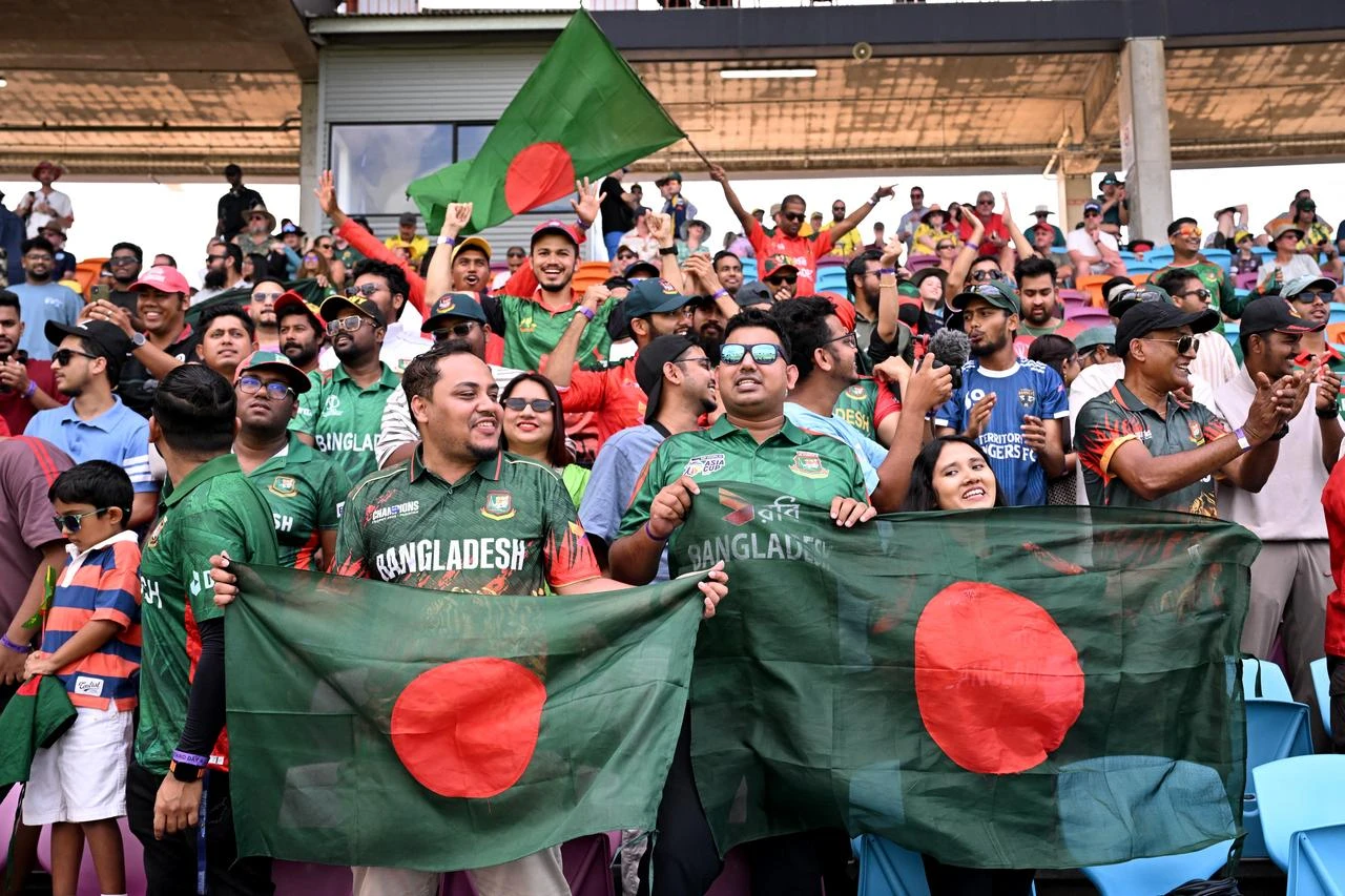 Bangladesh fans cheer their team on to victory on the fourth day of the first cricket Test match between Australia and Bangladesh at Marrara Stadium in Darwin on August 16, 2026. (AFP Photo)