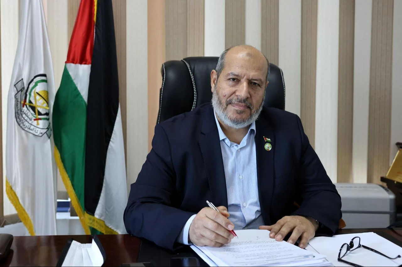 Khalil al-Hayya, senior leader and top Hamas legislative candidate, smiles during an interview with AFP at his office in Gaza City on April 21, 2021. (AFP Photo)