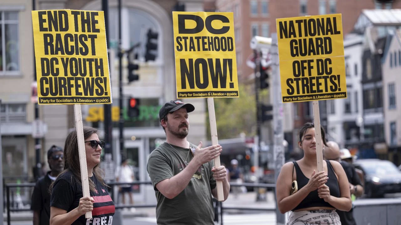 A year on, DC protesters demand end to federal deployment