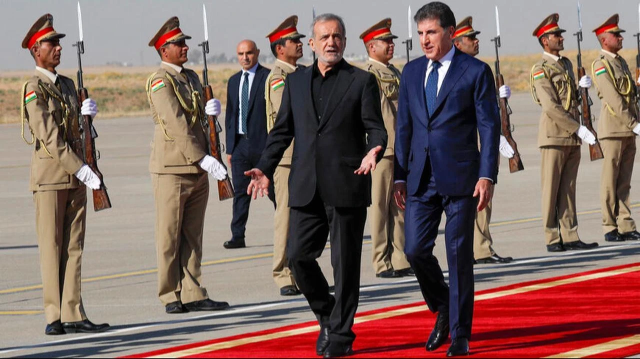 Nechirvan Barzani, president of Iraq’s Kurdish Regional Government (KRG), welcomes Iranian President Masoud Pezeshkian in Erbil, Sept. 12, 2024. (AFP Photo)