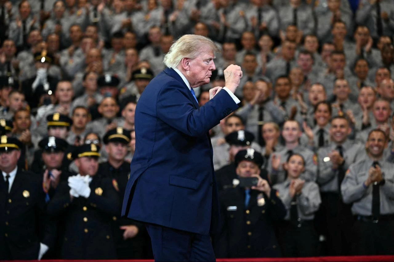 US President Donald Trump gestures as he departs after delivering remarks at the Nassau County Police Academy Center for Training and Intelligence in Garden City, New York, on August 14, 2026. (AFP Photo)