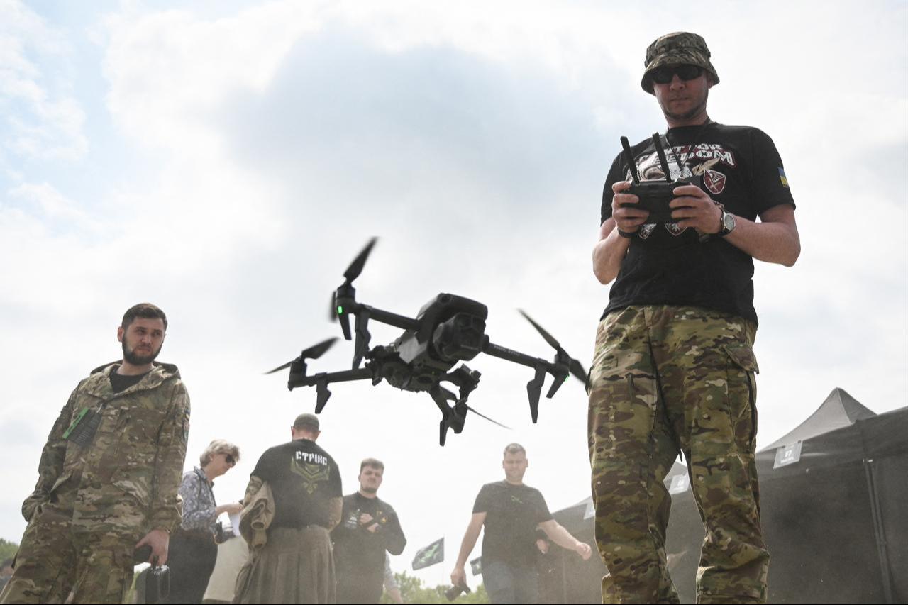 A Ukrainian serviceman pilots a drone during the “Wild Drones” racing competition in Truskavets, Lviv region, on May 20, 2026. (AFP Photo)