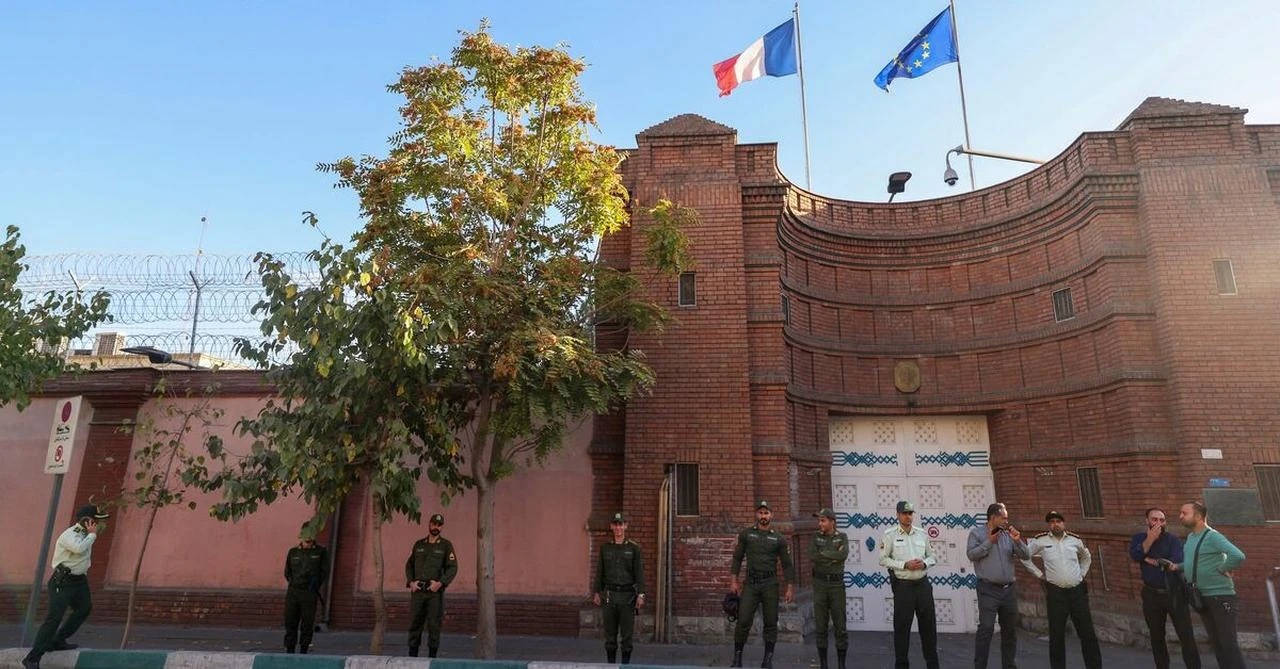 Iranian security forces stand guard in front of the French Embassy in Tehran in this undated image. (AFP Photo)