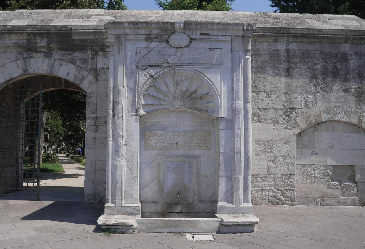 A historic Ottoman fountain, part of Istanbul's centuries-old water heritage, stands near one of the city's old water structures. (AA Photo)