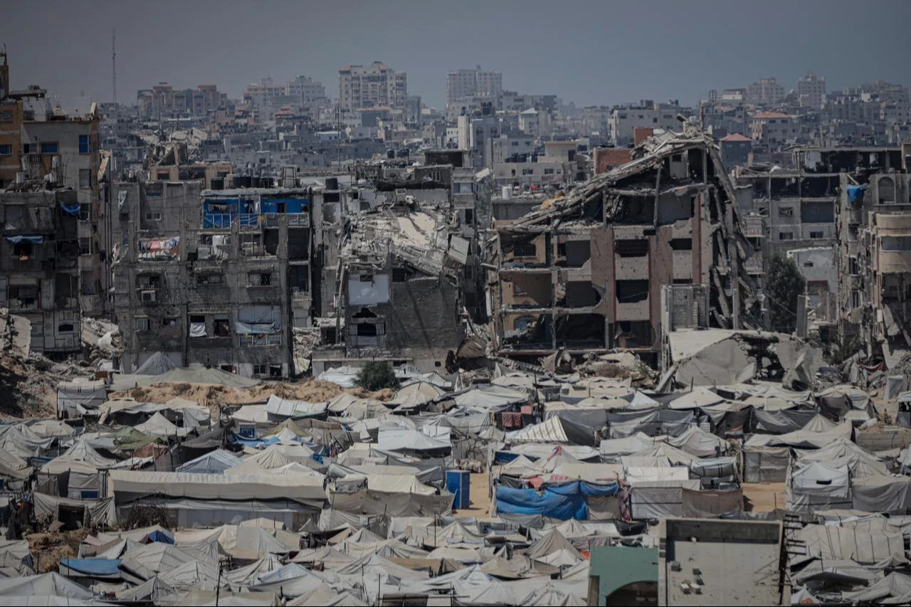 Displaced Palestinians live in makeshift tents near the site of the destroyed Al-Muqawwasi Towers as they struggle to cope with extreme summer heat in Gaza City, Gaza, Palestine, July 29, 2026. (AA Photo)