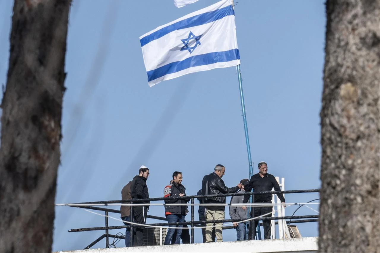 The Israel Land Authority teams, accompanied by Israeli police and Israel's National Security Minister Itamar Ben-Gvir, demolish structures at the headquarters of UNRWA in Jerusalem, Jan. 20, 2026. (AA Photo)