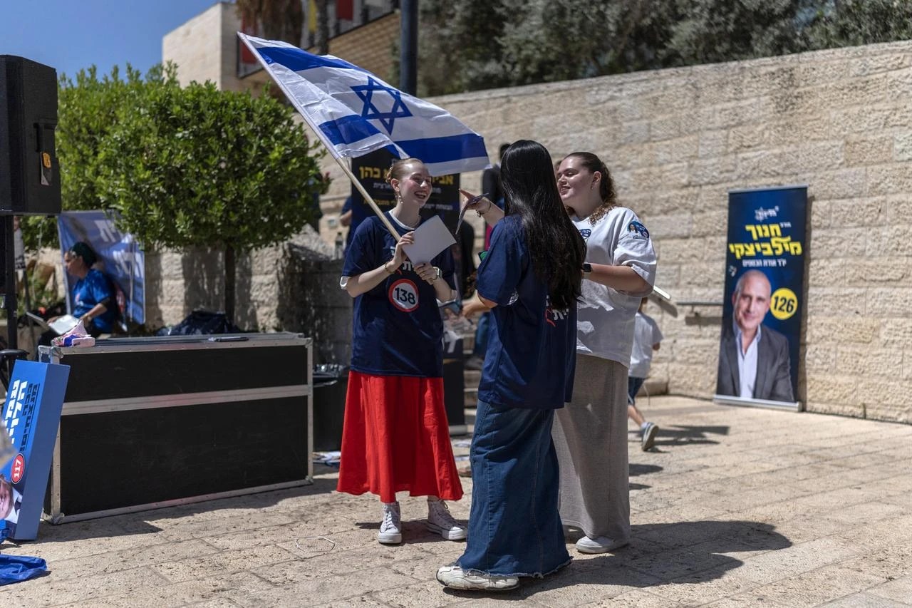 Members of Likud party gather at a polling station for the primary elections of their party ahead of country's national elections, in Jerusalem on August 17, 2026. (AFP Photo)