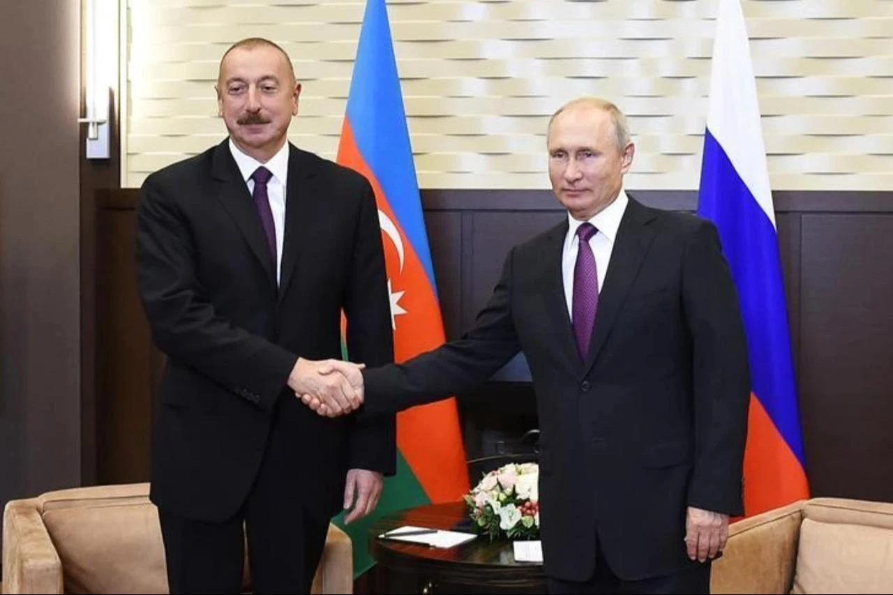 Russian President Vladimir Putin (R) meets with President of Azerbaijan Ilham Aliyev (L) in Sochi, Russia on September 1, 2018. (Azerbaijani Presidency / AA Photo)
