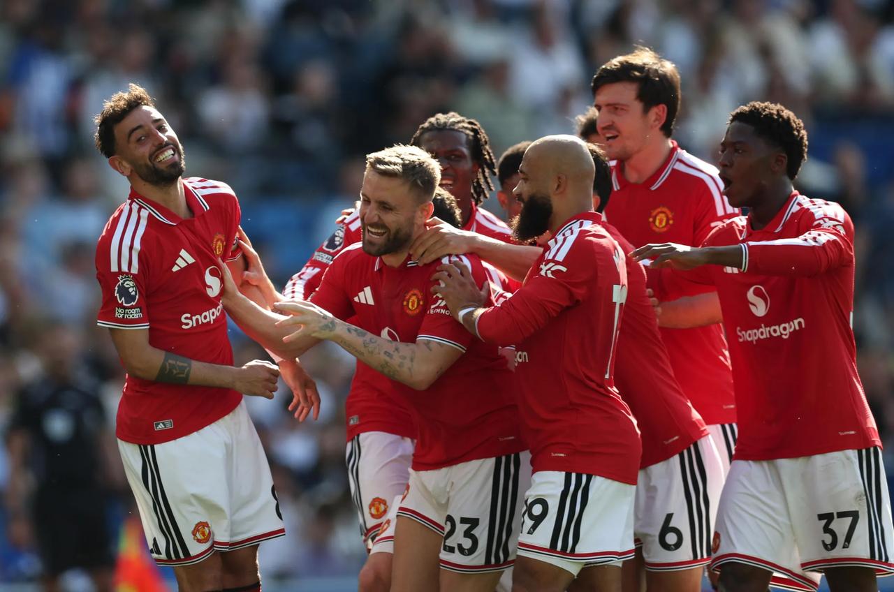 Bruno Fernandes of Manchester United celebrates scoring his team’s third goal with teammates during the Premier League match between Brighton & Hove Albion and Manchester United at the Amex Stadium on May 24, 2026 in Brighton, England. (AFP Photo)