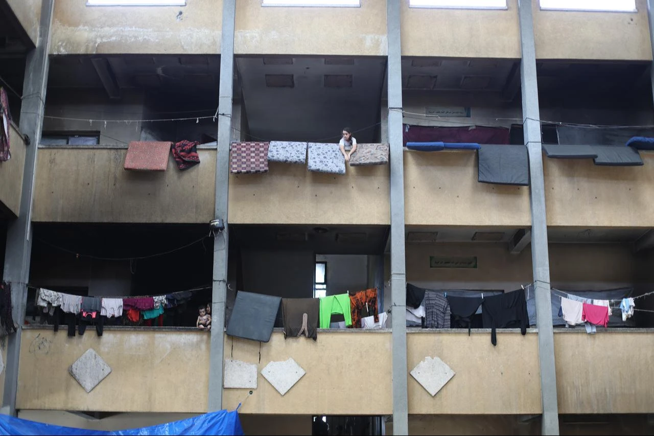 Displaced Palestinians who lost their homes in Israeli army attacks and are unable to return to their neighborhoods due to the “yellow line” remain in tents set up in a school and its courtyard at the Nuseirat Refugee Camp in the central Gaza Strip, Palestine, Aug. 17, 2026. (AA Photo)
