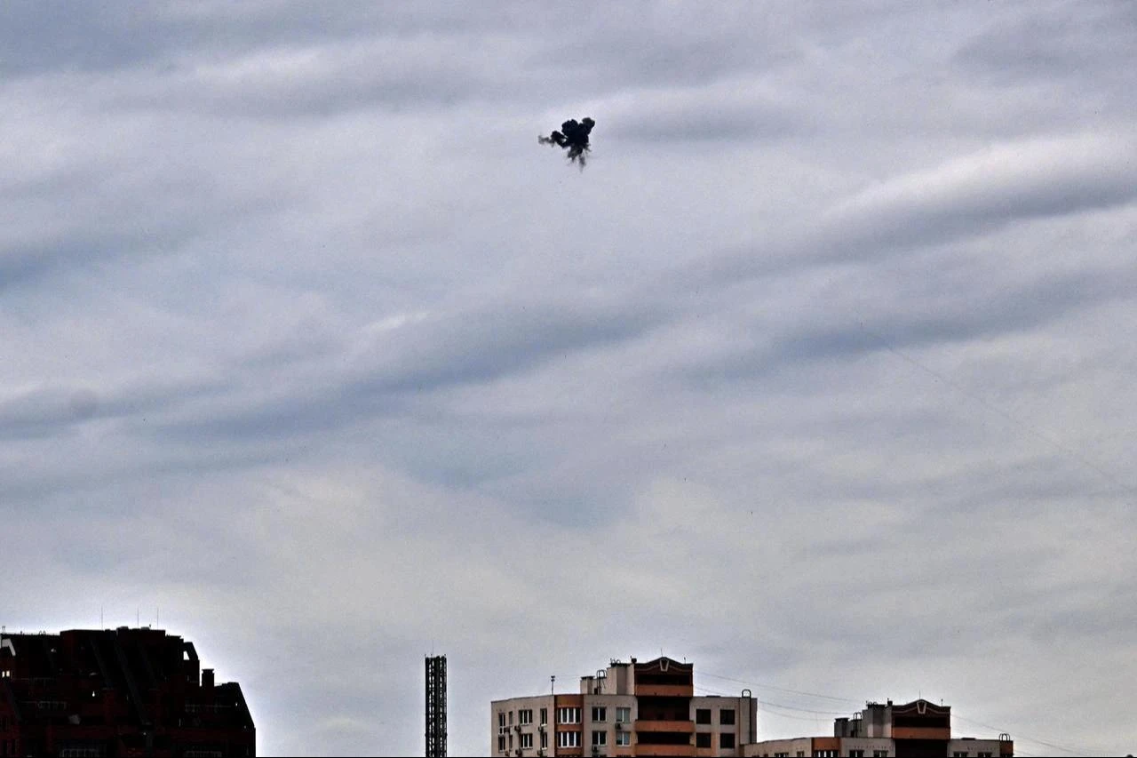 This photograph shows an explosion as Ukrainian air defence shoot down a drone above Kyiv during an attack on the Ukrainian capital on August 8, 2026.(AFP Photo)