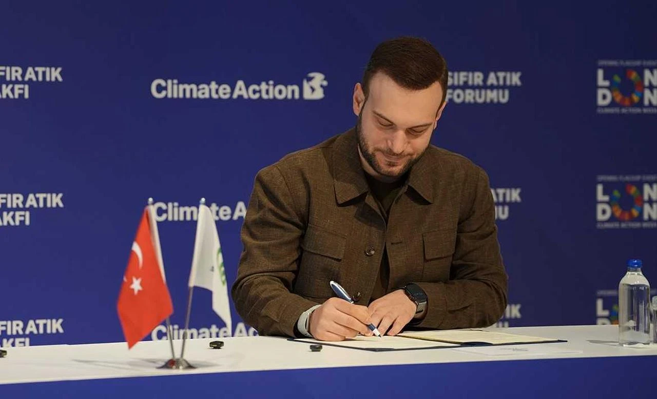 A representative signs a cooperation protocol between Türkiye’s Zero Waste Foundation and London Climate Action Week during a ceremony in Istanbul, Türkiye, Aug. 17, 2026. (AA Photo)
