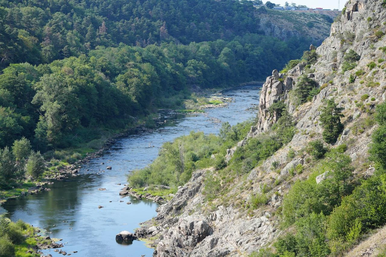 Low water levels are seen in a river near Feurs, France, as severe drought affects the Loire River basin and surrounding waterways, Aug. 17, 2026. (AA Photo)